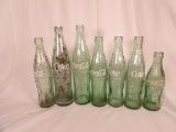 LOT OF (7) VINTAGE COKE BOTTLES