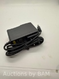 AC/DC adapter Model 0910 DC9V 1A