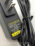 AC/DC adapter Model 0910 DC9V 1A