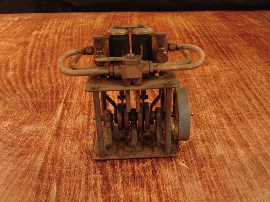 Small scale table top display of a working engine