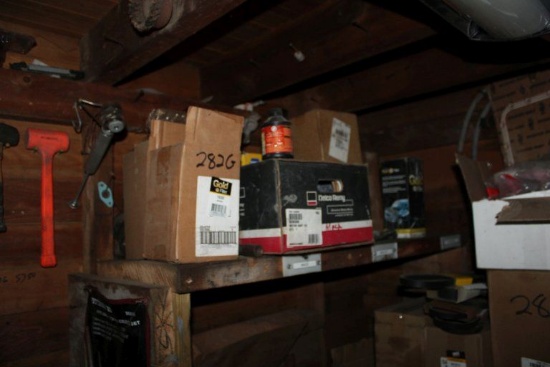 Shelves of Lubricants, Belts, Oil Filters, and Contents