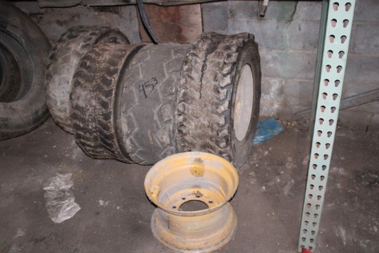 4 CAT Skid Steer Wheel and Tire Combos