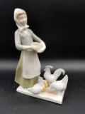 Girl Feeding Chicks- Saxe