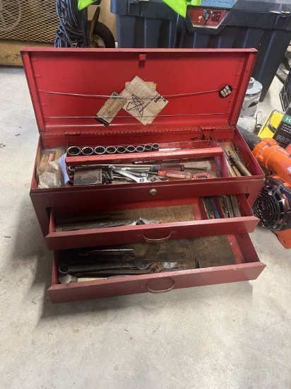 Vintage red tool box with contents