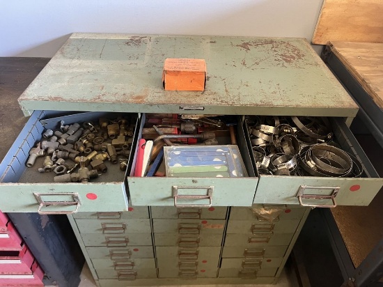 Green metal storage tool box with vintage contents