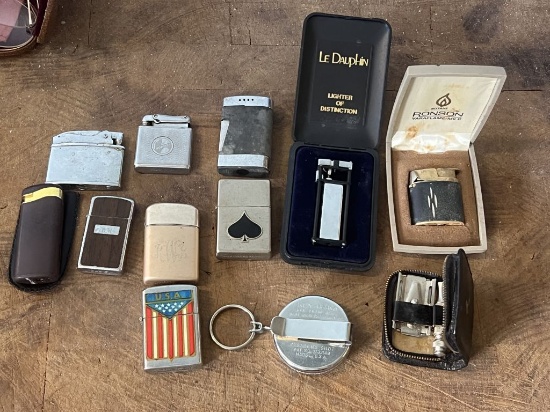 Grouping of vintage lighters and accessories