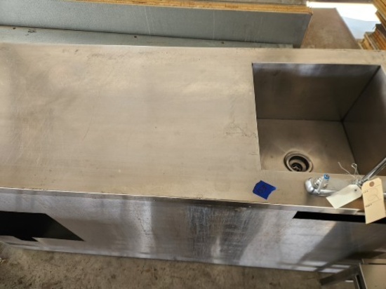 Stainless table with deep sink