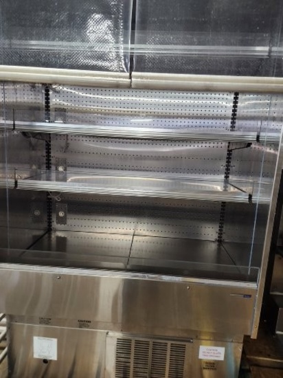 Display case with curtains