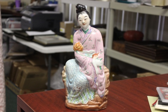 A Chinese Porcelain Figure of a Lady