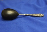 A Sterling Handle Wooden Sock Darner