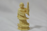 A Carved Bone Chess Piece