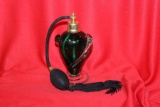 A Green Glass Parfume Bottle