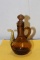 An Old Amber Glass Ewer