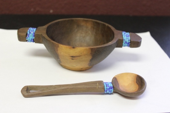 A Decorative Wooden Bowl and Spoon