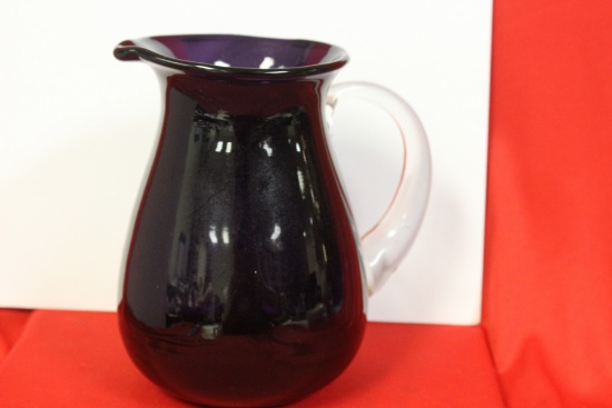 An Amethyst Glass Pitcher