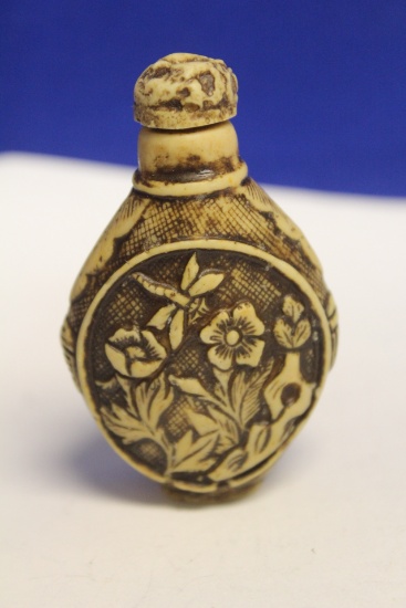 A Carved Resin Snuff Bottle