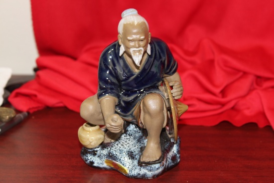 A Chinese Pottery Figurine