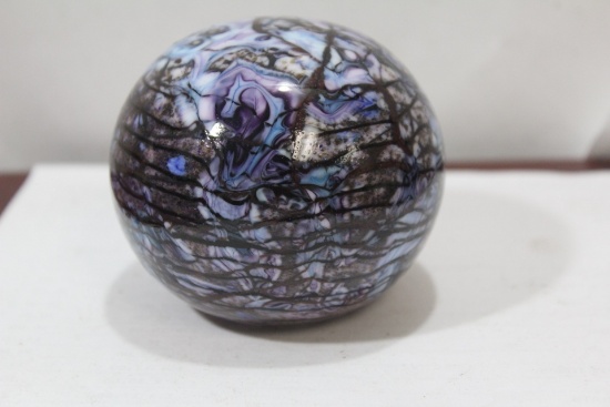 A Signed Paperweight