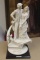 Armani figurine on stand