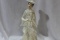 A Ceramic Girl Figurine