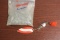 A Bag of Fishing Weights and a Lure