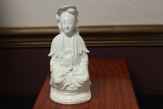 A Chinese Ceramic Blanc de China Kwan Yin