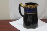 An Antique Pottery Pitcher