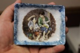 An Enamel Dish Depicting Two Young Children