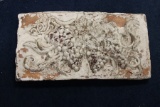 A Ceramic / Clay Plaque Raised or Embossed Design