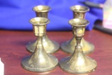 A Lot of 4 Brass Candle Holders