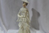 A Ceramic Girl Figurine