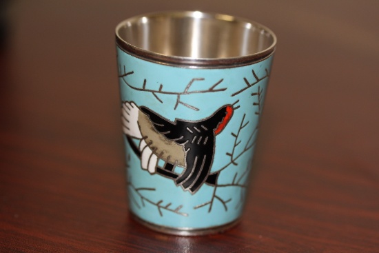 An Enamel Shot Glass
