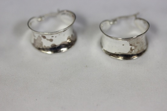A Pair of Sterling Earrings