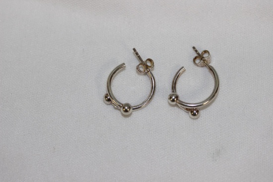 A Pair of Sterling Earrings