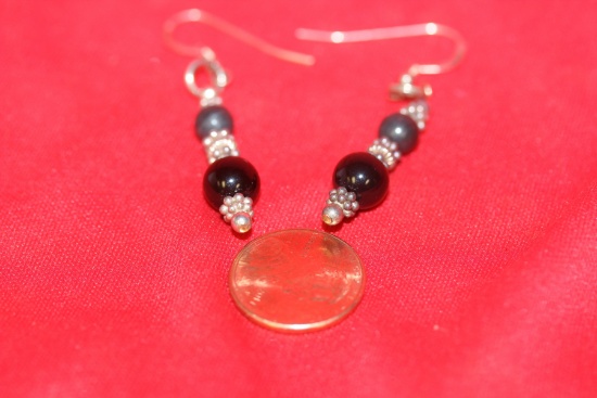 A Pair of Sterling Earrings