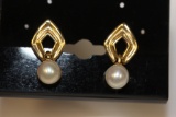 A Pair of 14 Karat Gold Earrings