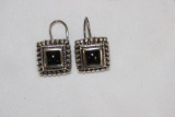 A Pair of Sterling Earrings