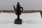 A Solid Metal Teapot on Stand