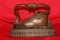 A Bronze or Metal Baby Shoe
