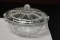 A Round Glass Candy Dish With Lid