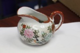 A Kutani Creamer