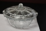 A Round Glass Candy Dish With Lid