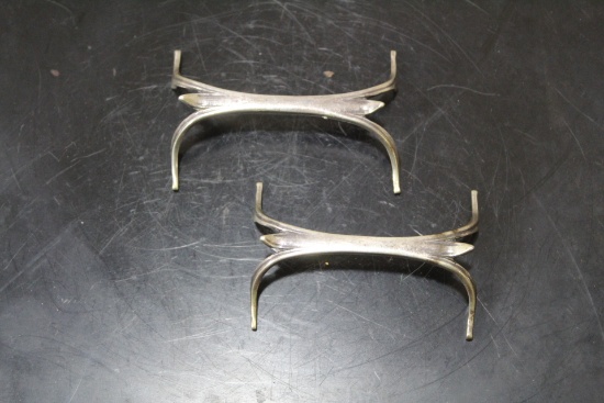 A Pair of Sterling Knife Rests