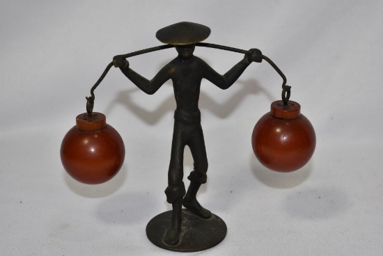 A Deco Bakelite and Cast Iron Walker/Dancer