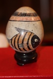 Carved Stone Egg on Woodstand