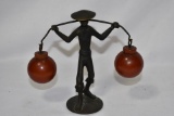 A Deco Bakelite and Cast Iron Walker/Dancer