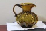 An Amber Glass Water Pitcher