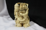 A Carved Bone Oriental Warrior
