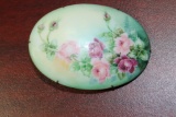 A Porcelain Brooch