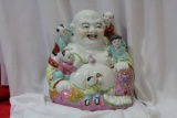 A Vintage Porcelain Buddha with Children